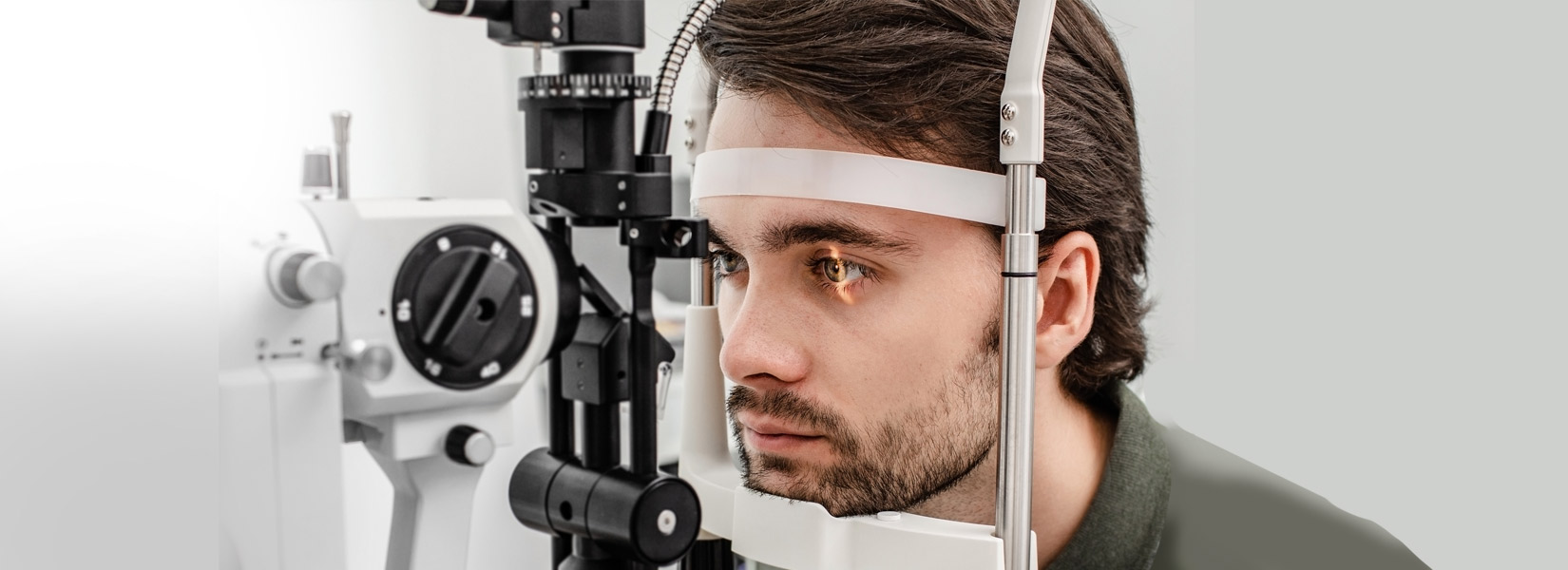 young man during eye exam in Downtown Seattle